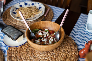 green salad with blood oranges, goat cheese and red pepper