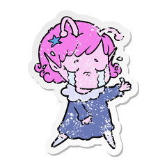distressed sticker of a cartoon crying alien girl