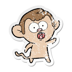 distressed sticker of a cartoon shocked monkey