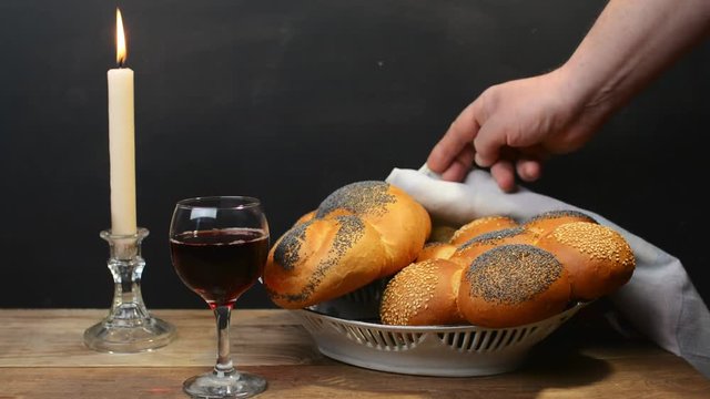 Homemade challah, wine for Kiddush and candles for Shabbat