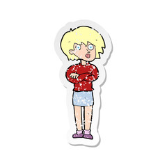 retro distressed sticker of a cartoon woman wit crossed arms