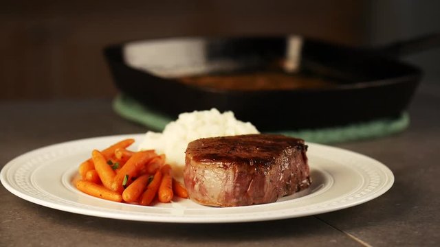 Serving prime rib on plate