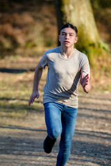 Teenage boy outside on a bright Spring day