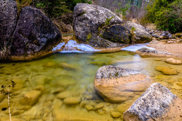 Frosty creek of water in the winter.