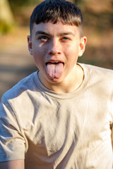 Teenage boy outside on a bright Spring day