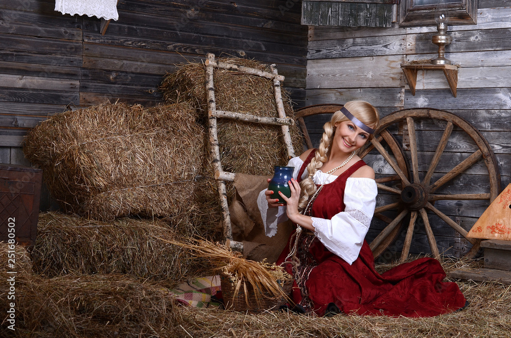 Wall mural Beautiful woman portrait in russian style. Beautiful Russian girl in traditional dress. Russian style.