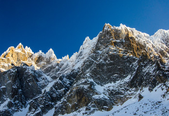 Mountains landscape in french Chamonix Mont Blanc during winter. Amazing view from Aiguille du Midi. Best place for skiing and winter holiday in french Alps.