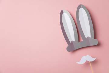 Easter bunny ears with white moustache top view flay lay easter background