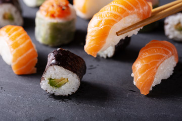 Fresh seafood sushi meal on darck background