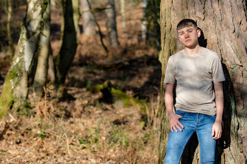 Teenage boy outside on a bright Spring day