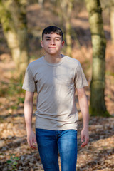 Teenage boy outside on a bright Spring day