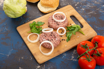 Raw minced beef burgers