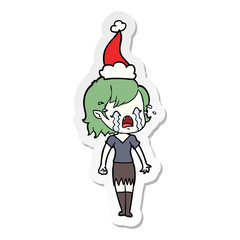 sticker cartoon of a crying vampire girl wearing santa hat