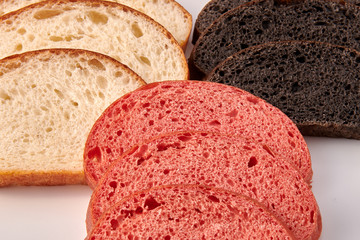Colored hamburger buns cut slices and isolated on white background