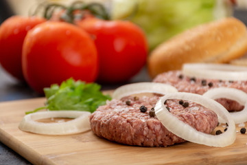 Raw minced beef burgers