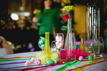 Decorated table with decorative elements for the day of Holy Easter