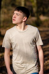 Teenage boy outside on a bright Spring day