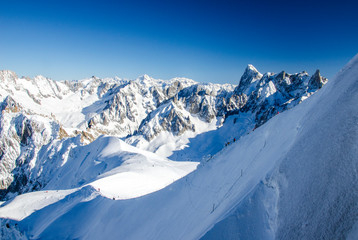 View of amazing french Alps covered with snow. Chamonix-Mont-Blanc during winter time. Perfect winter destination. 