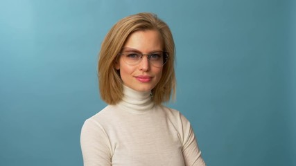 Artistic model wearing a fancy sun glasses