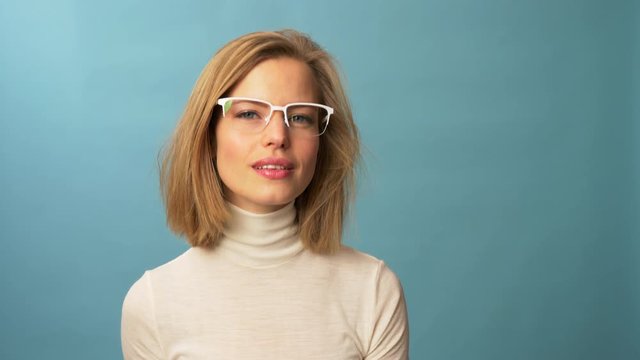 Funny model wears four types of glasses simultaneously