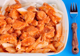 goulash with meat pieces and pasta close up