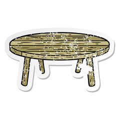 distressed sticker of a cartoon table