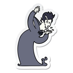 sticker of a cartoon vampire