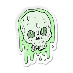 sticker of a cartoon slimy skull