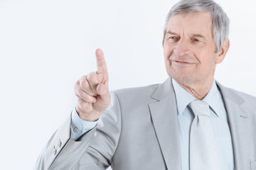 Mature businessman pointing finger to virtual point