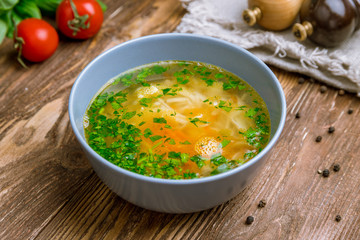 Chicken soup bouillon in a plate