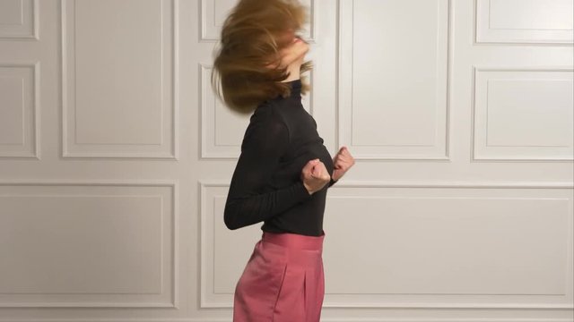 Female model with a BIG YES expression