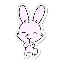 distressed sticker of a curious bunny cartoon