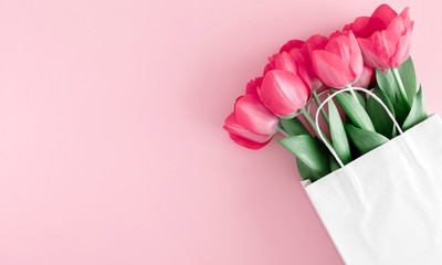 Flowers composition romantic. Flowers pink tulips on pastel pink background. Wedding. Birthday. Happy woman's day. Mothers Day. Valentine's Day. Flat lay, top view, copy space