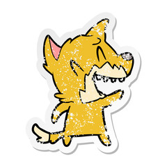 distressed sticker of a laughing fox cartoon