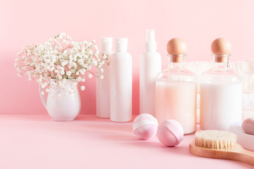 Soft light bathroom decor for advertising, design, cover, set of cosmetic bottles, light pink pastel background. mock up