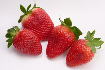close up picture of fresh strawberries with white background