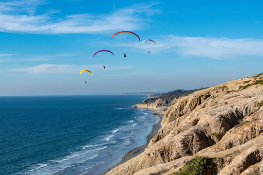 Paragliding Over The Cliffs And Beach