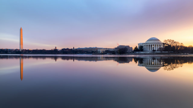 The Washington Monument And Jefferson Memorial at Late Sunrise