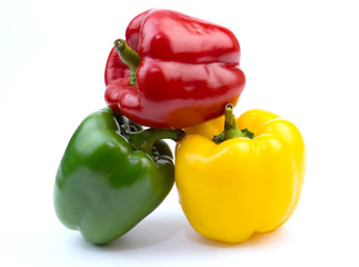 Green, Red and yellow bell pepper isolated on white background