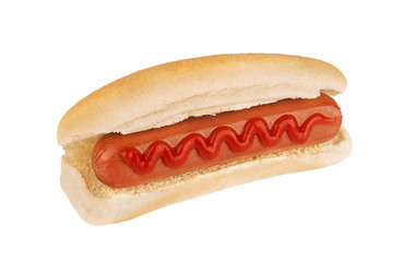Close up on hot dog with ketchup on top, isolated on white background. Side view.