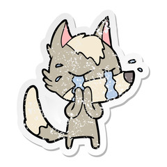 Obraz na płótnie Canvas distressed sticker of a cartoon crying wolf