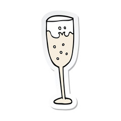sticker of a cartoon champagne glass