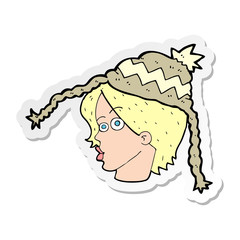 sticker of a cartoon woman wearing winter hat