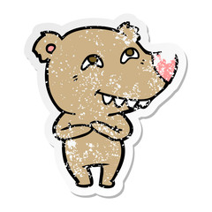 distressed sticker of a cartoon bear showing teeth