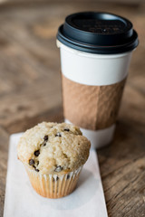 Coffee cup and muffin