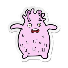 sticker of a cartoon funny slime monster