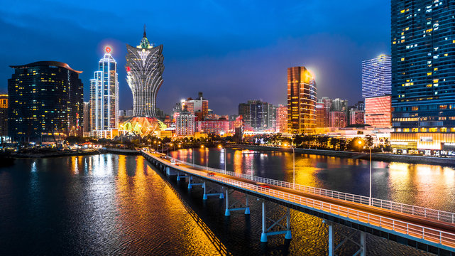 Macau cityscape at night, all hotel and tower are colorful lighten up with blue sky, Macau, China.