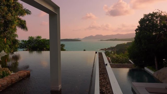 Infinity Pool Water Surface with Sea View at Sunset