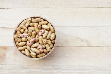 Roasted peanut, snack, in classic wooden bowl