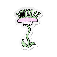 retro distressed sticker of a cartoon flower